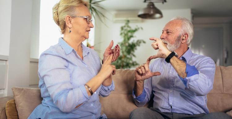 Couple using sign language 