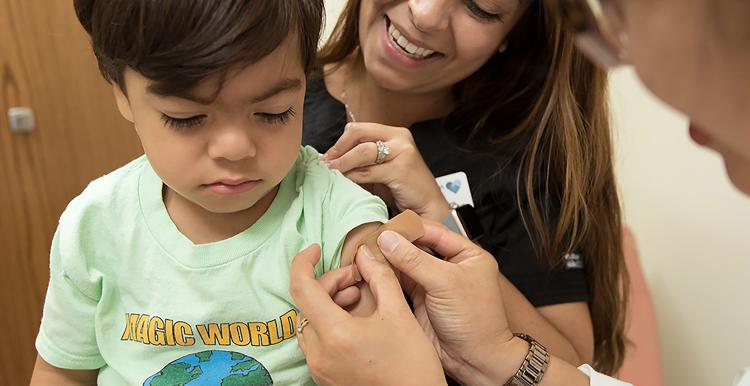 Young child receiving a vaccination