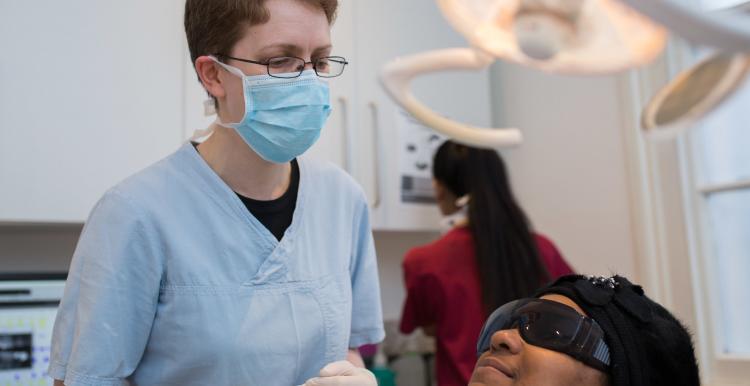 Dentist with patient